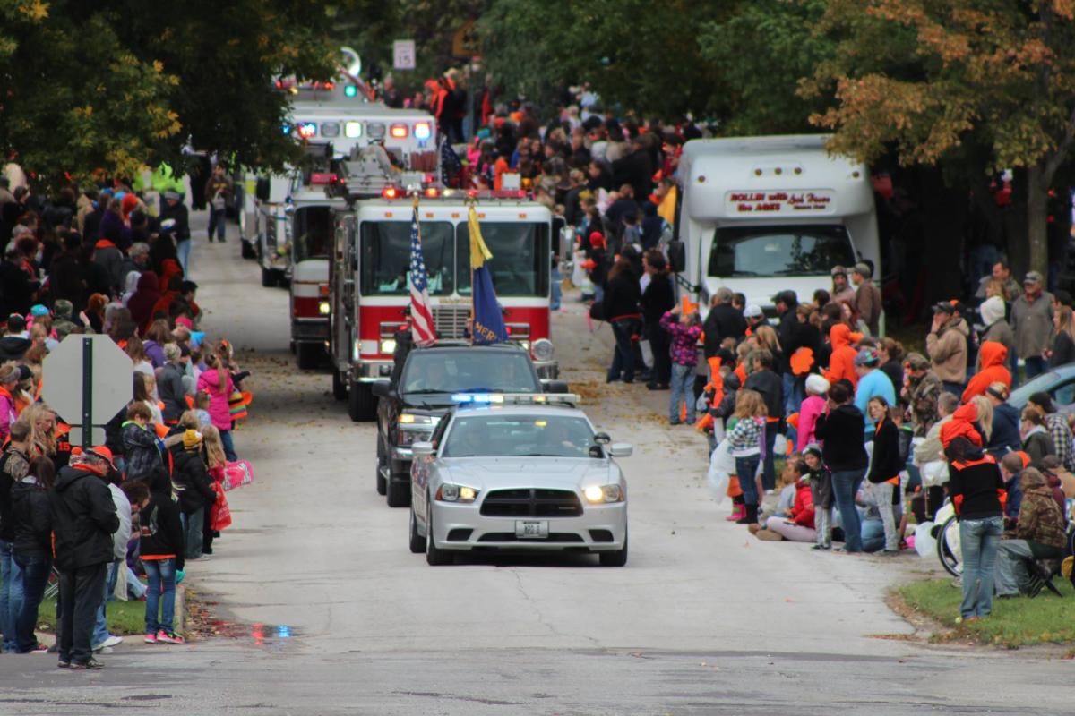 Police car and fire trucks from Macon Homecoming Parade